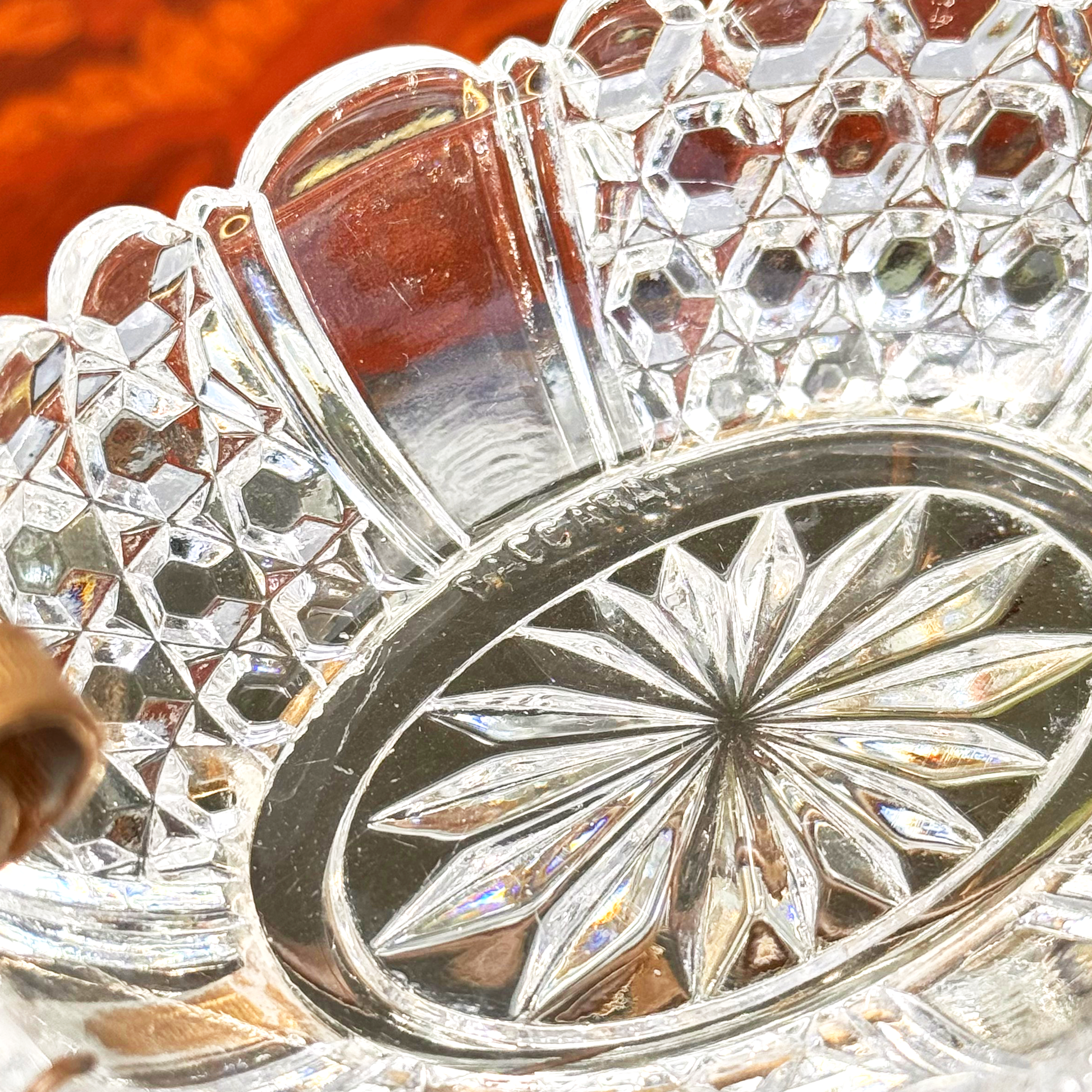 Close-up of the star-cut pattern and the "BACCARAT" marking on the inside bottom of the Baccarat crystal catchall
