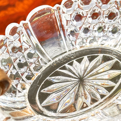 Close-up of the star-cut pattern and the "BACCARAT" marking on the inside bottom of the Baccarat crystal catchall