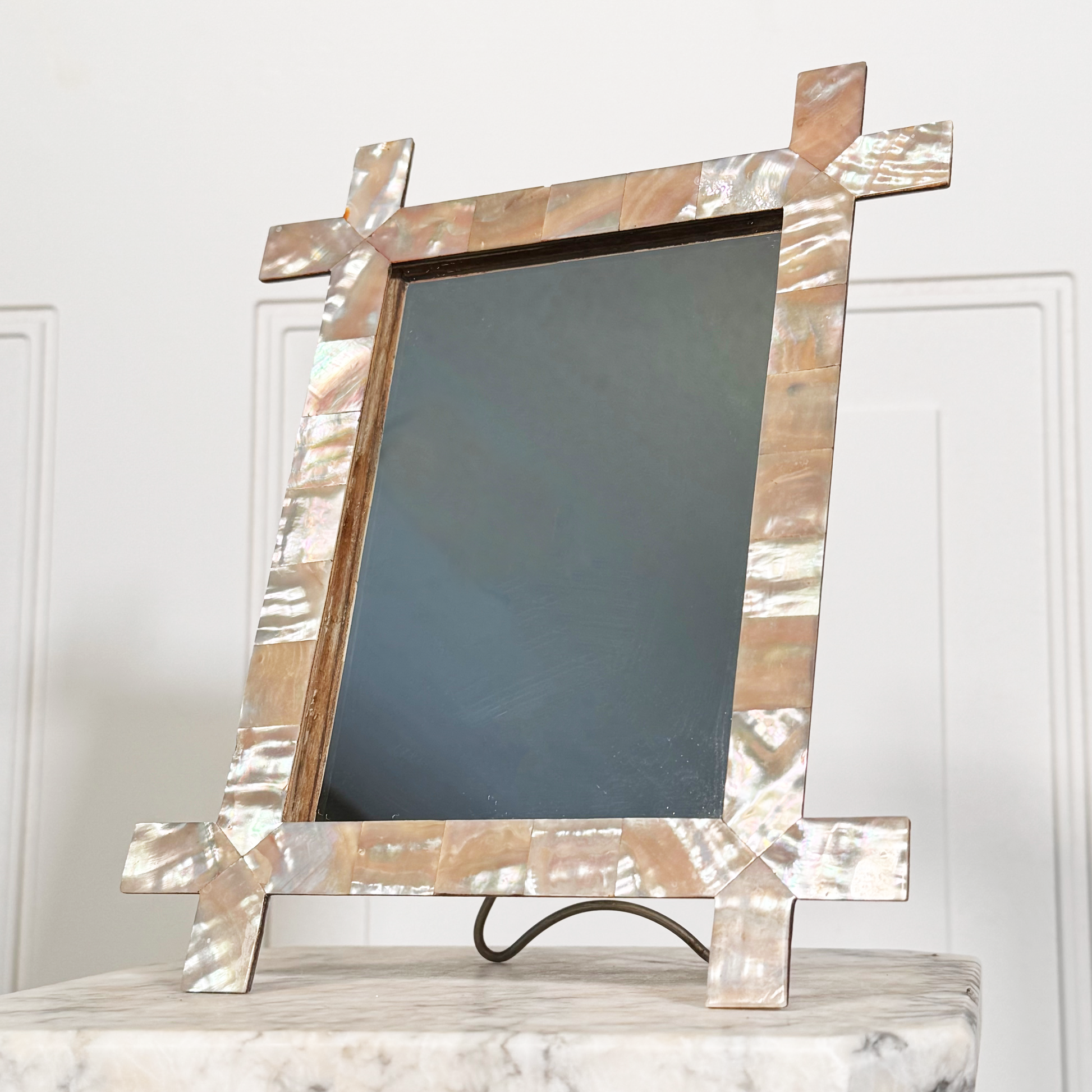 Antique mother-of-pearl inlaid framed mirror, front lower angled view