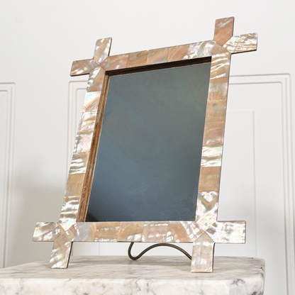 Antique mother-of-pearl inlaid framed mirror, front lower angled view